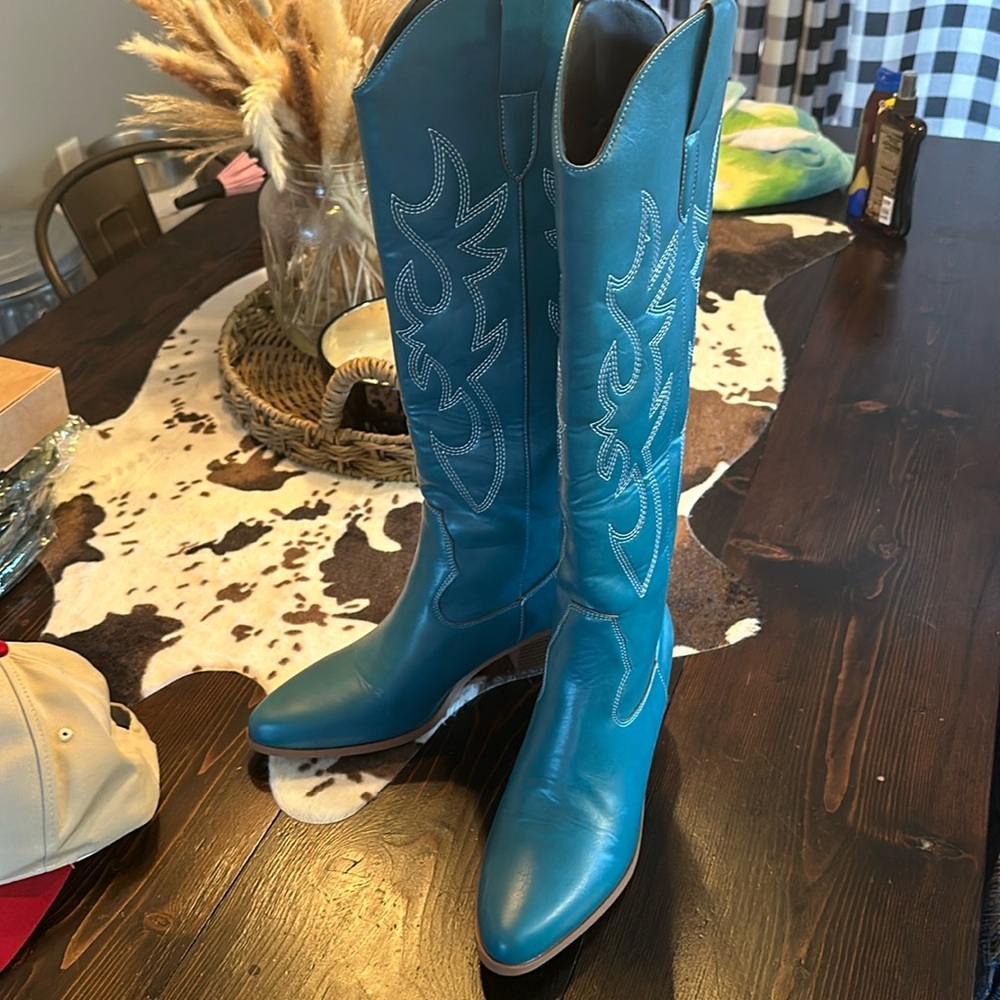 Teal women’s cowboy boots- come up to under the knee
